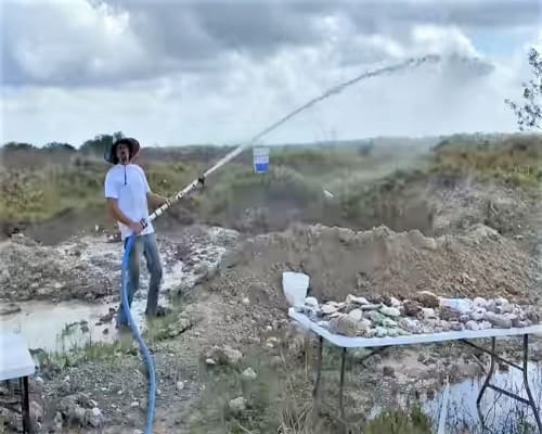Bryan with a hose, Florida 2021